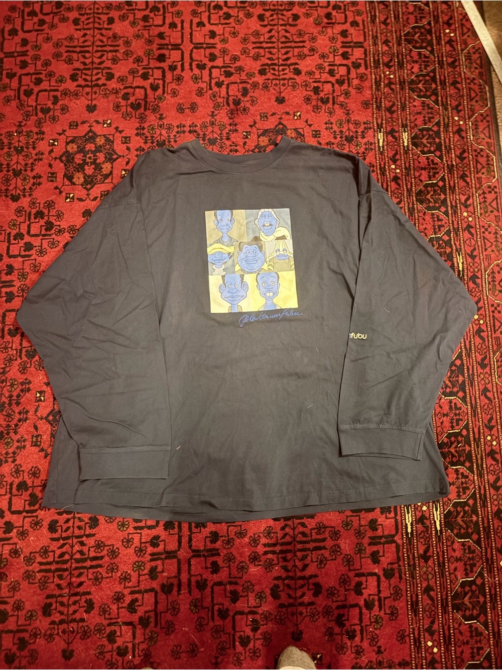 Black Long-Sleeve Graphic Tee with Yellow & Blue Illustration
